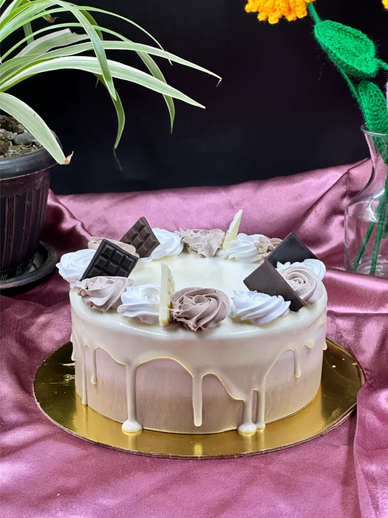 Slice of triple layer chocolate cake in Pokhara