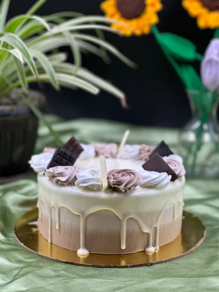 Close-up of decadent triple chocolate cake texture with three distinct chocolate layers
